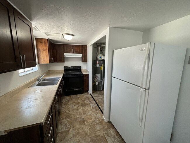 Building Photo - 3359 W. &amp; 3369 W. 4100 S. WVC - DUPLEX