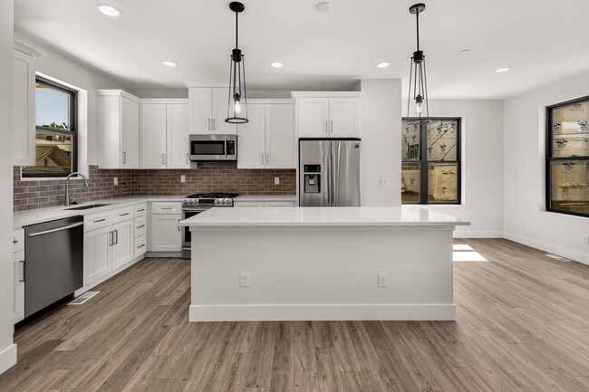 kitchen island seating - 5634 South Curtice Street Townhome