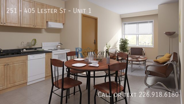 Photo du bâtiment - 405-405 Lester St