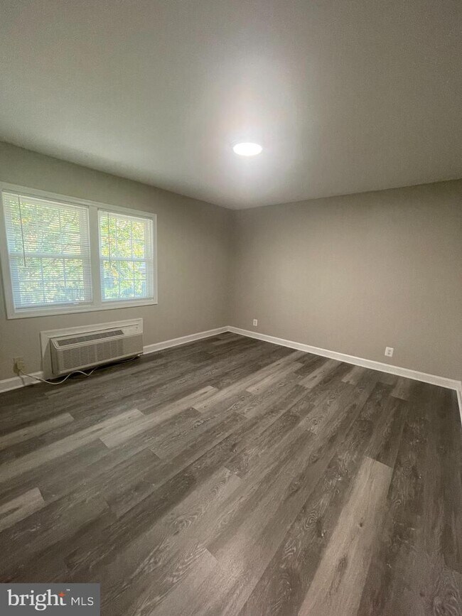 Building Photo - 110 N College Dr