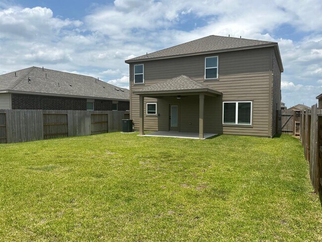 Building Photo - 1006 Whispering Winds Dr