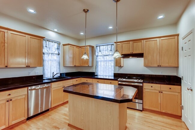 Building Photo - Stylish Townhome with Dual Primary Suites, Bonus Room & Prime Location Near Intel!