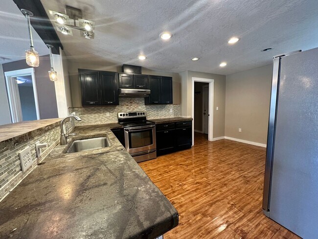 Building Photo - new carpet installed, 600sqft bonus room with large RV/Boat parking space