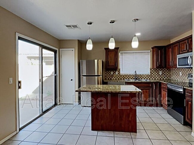 Building Photo - 12950 W Voltaire Ave
