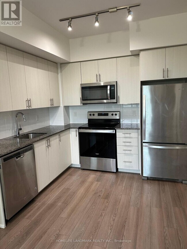 Building Photo - 3121-3121 Sheppard Ave E