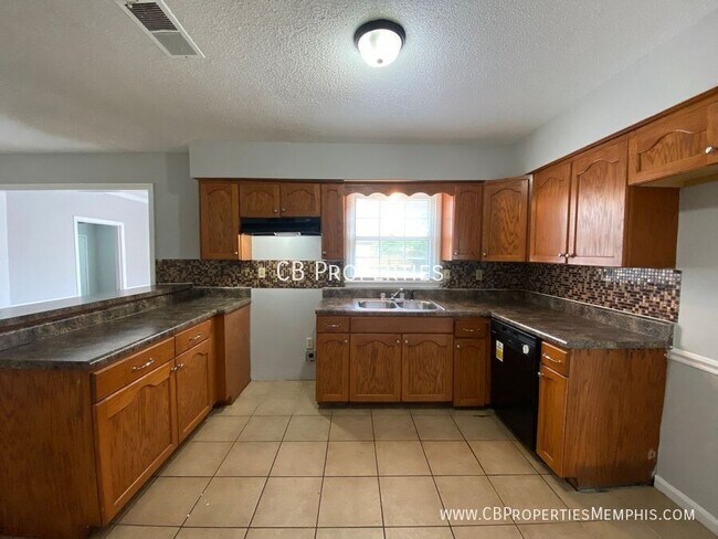 Foto del edificio - 5011 Pheasant Run Ln