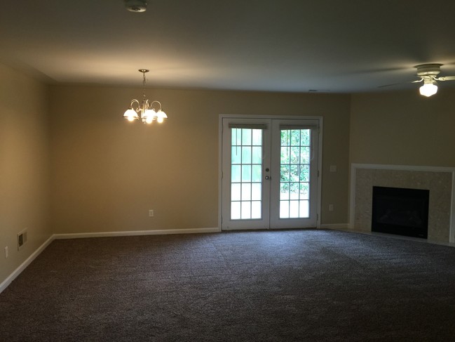 Family room with gas fireplace - 8115 Kimball Dr