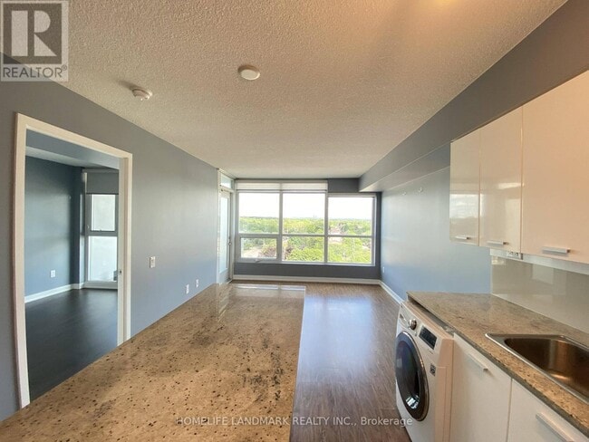 Building Photo - 15-1115 Singer Ct