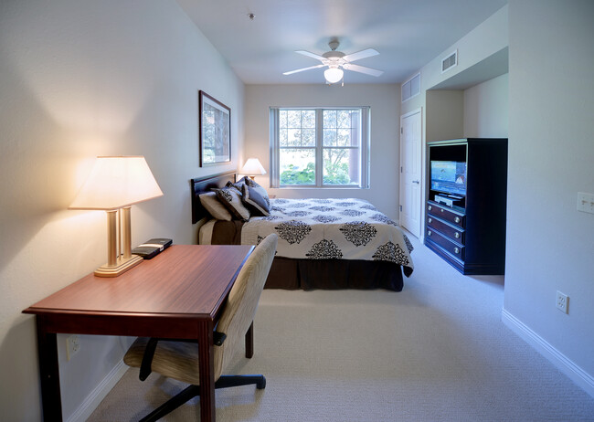 Furnished Bedroom - The Apartments at Corporate Cove