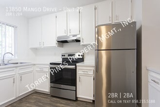 Building Photo - 13850 Mango Dr