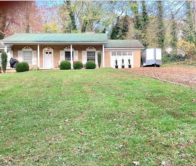 Driveway is shared with 1 other unit - 3441 Brevard Rd