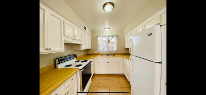 Primary Photo - Huge Adobe 2 Bed/1Bath Adobe Townhome in C...