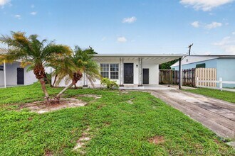 Building Photo - 410 NW 52nd Ct