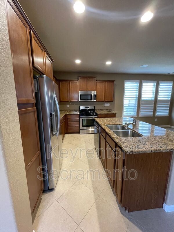 Building Photo - 6115 Passiflora Ln