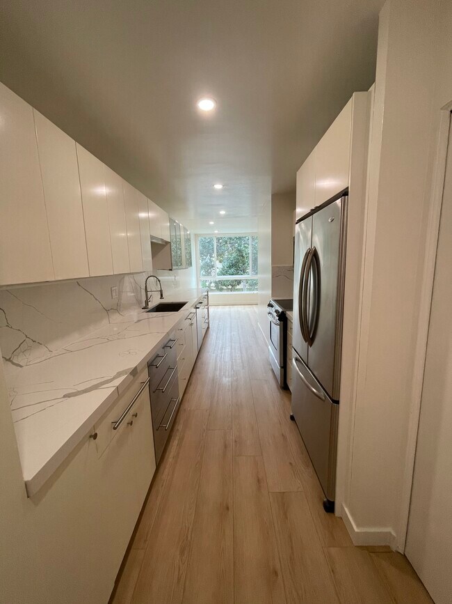 Ample cabinet space - 424 N Palm Dr