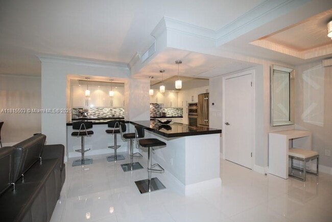 Building Photo - 9801 Collins Ave