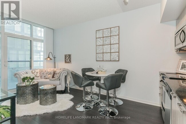 Building Photo - 36-8136 Lisgar St