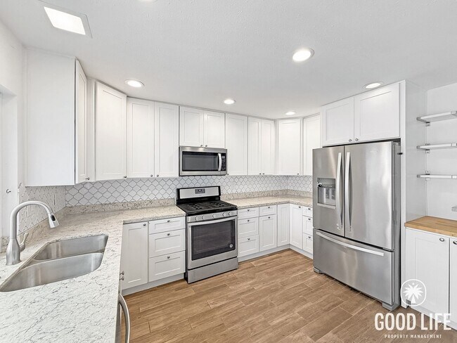 Building Photo - Amazing 4 Bedroom Home with Attached Garage and Updates Throughout!