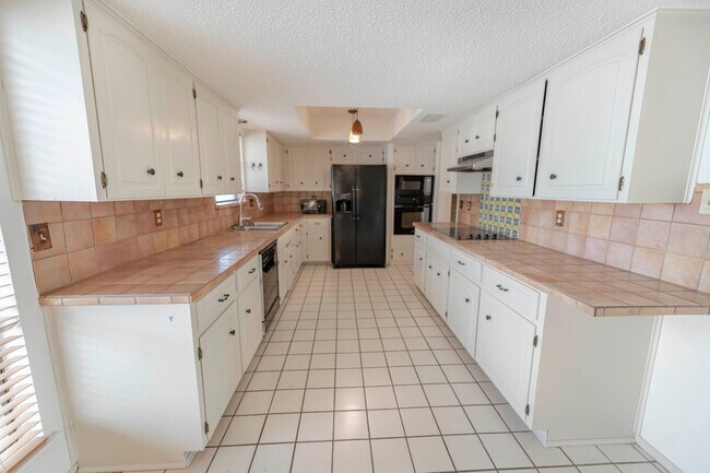 Foto del edificio - Charming Condo with Golf Course Views in O...