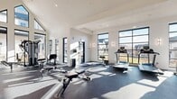 Located in Heber City, Utah, this modern fitness center is a thoughtfully designed single-floor facility offering a comprehensive workout environment. The space is defined by its dramatic vaulted ceilings and expansive floor-to-ceiling windows framed in sleek black steel, which flood the interior with natural light and provide open views of the surrounding neighborhood and mountain landscape.

The layout is generously proportioned, accommodating a wide variety of exercise equipment without feeling crowded. The cardio zone features multiple treadmills, an elliptical trainer, and stationary spin bikes equipped with interactive display screens. The strength training area includes a multi-station cable machine, adjustable weight benches, a full dumbbell rack, kettlebells, a stability ball, and step platforms. A large wall mirror extends along one side of the room, enhancing the sense of space and supporting proper form during workouts. A wall-mounted flat-screen television is positioned for easy viewing throughout the space.

The interior finishes are clean and contemporary, with crisp white walls, recessed lighting, and durable dark rubber flooring suited for high-impact use. Sconce lighting adds a polished touch to the bright, airy atmosphere. French doors provide direct access to the outdoors, further connecting the space to its natural surroundings. The overall design balances functionality with a refined aesthetic, making this a standout fitness facility.