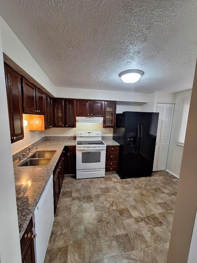 Foto del edificio - 4332 Thistlewood Terrace