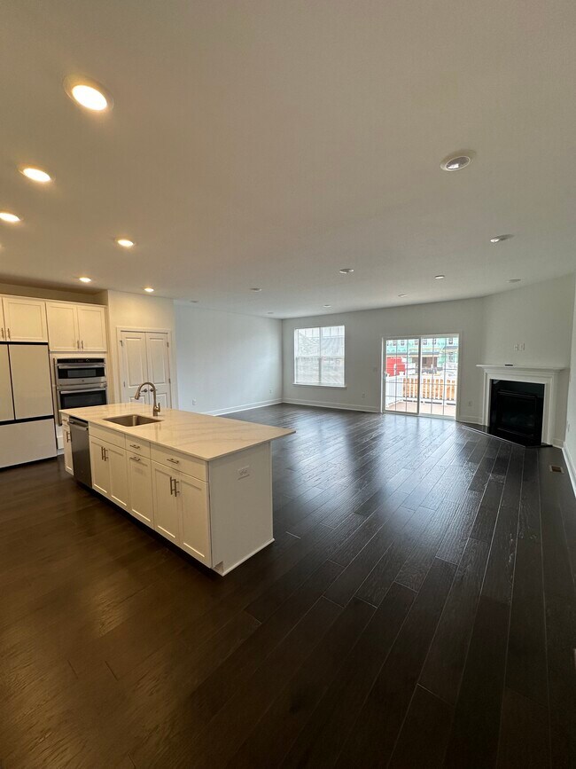 Kitchen/living room with fireplace - 1604 Wrangler Ave