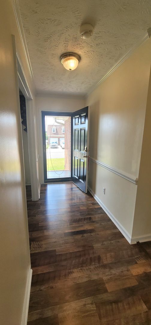 Foto del edificio - Beautiful 3 Bedro Brick Ranch Home w/ Bonus Room- Minutes from Interstate and Close to Shopping.