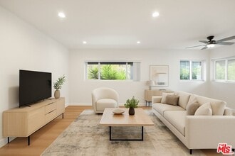 Building Photo - 8440 Willoughby Ave