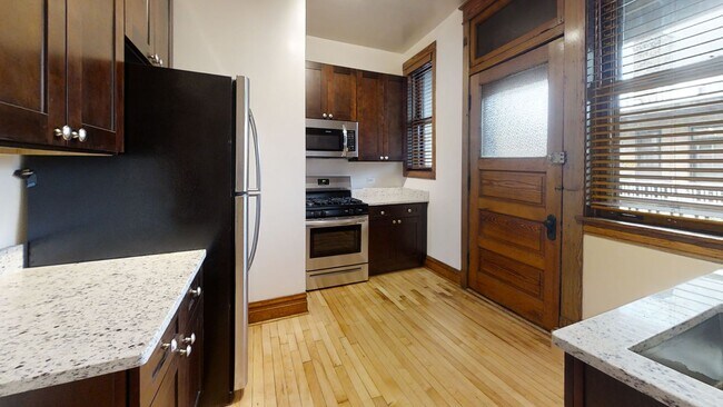 Photo - Fantastic three bedroom, one bath in the heart of Wrigleyville Available July 1, 2026 Apartment