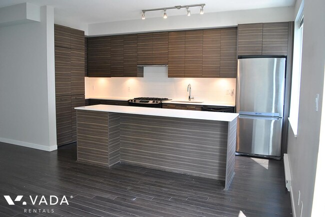Photo du bâtiment - Cassia Apartment Rental 22-6965 Hastings S...