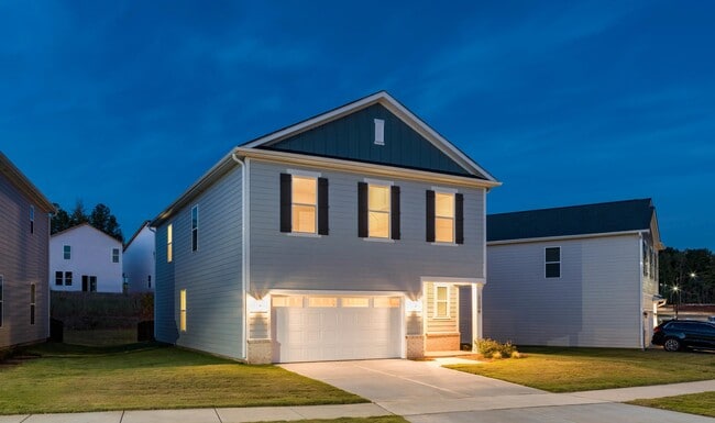 A private single-family home at Amavi Brier Creek, offering modern design, an attached garage, and a quiet Durham setting near Brier Creek conveniences. - Amavi Brier Creek