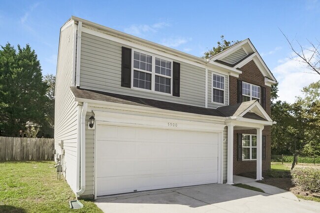 Foto del edificio - 5900 Hidden Meadow Ln