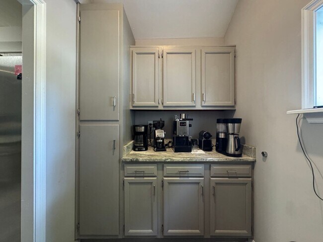 Building Photo - Welcome to this stunning 4-bedroom "ASK AB...