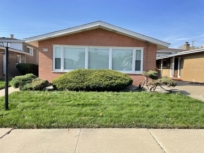 Building Photo - 9210 S Bennett Ave