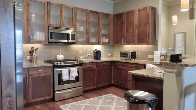 Building Photo - SKYROCK CONDOMINIUM JUST BLOCKS FROM CAMPUS!