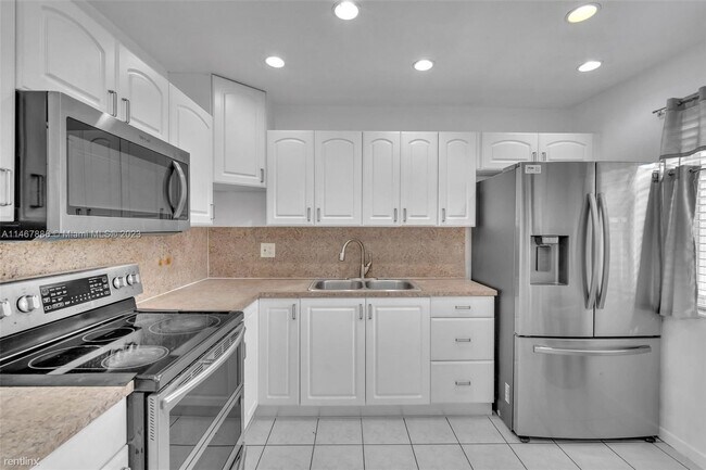 Foto del edificio - 4 br, 2 bath House - 601 N 64th Ter