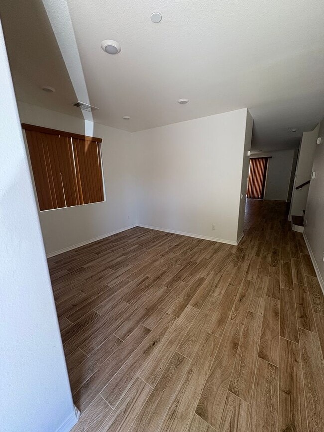 Building Photo - Spacious 4-Bedroom Home with Large Backyard.
