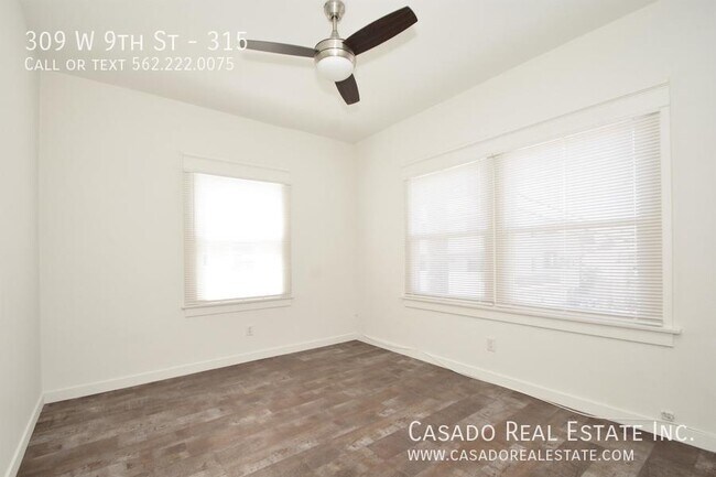 Foto del edificio - 309 W 9th St