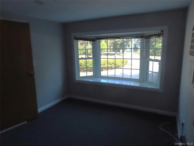 Building Photo - 1210 Smithtown Ave