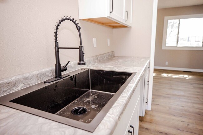 Building Photo - Beautifully remodeled three bedroom home a...