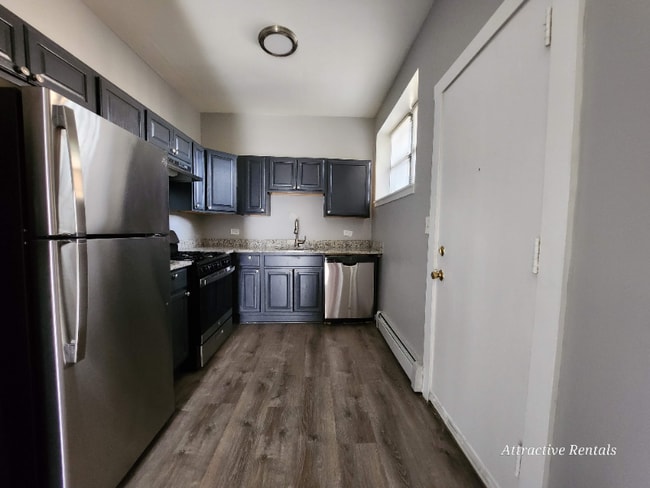 Foto del edificio - 5647 W Washington Blvd