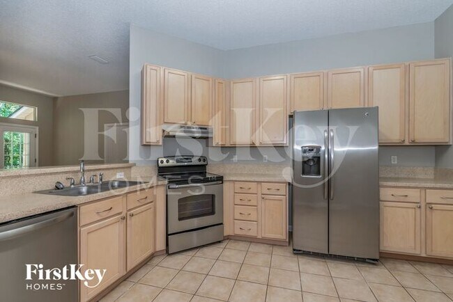 Foto del edificio - 7444 Lake Plantation Ln