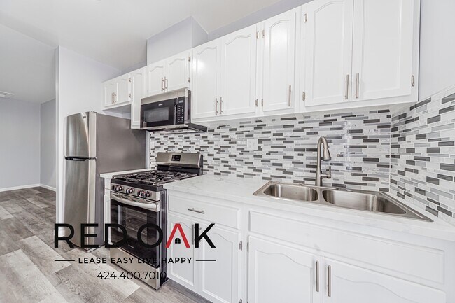 Foto del edificio - 1032-1036 S Normandie Ave-1032-202