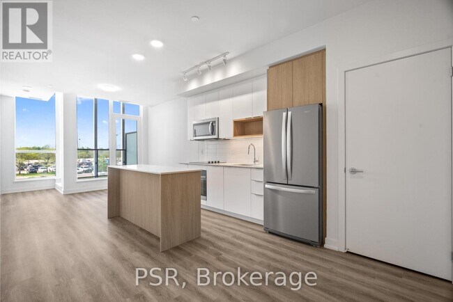 Photo du bâtiment - 4235-4235 Confederation Pkwy