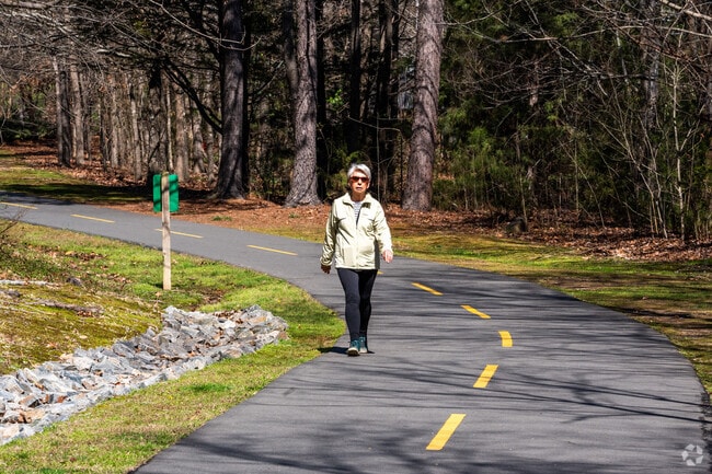People walk and bike to amenities within the Chapel Hill neighborhood.