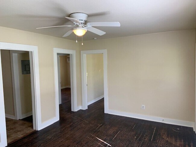 Building Photo - *COMING SOON* Charming Cottage Retreat with Fenced Yard!