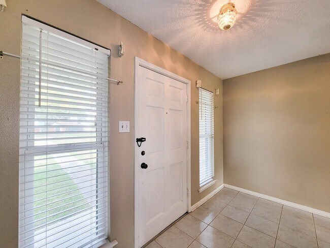 Building Photo - This spacious 4-bedroom, 2-bathroom lease home in Baytown, Texas, offers the perfect blend of com...