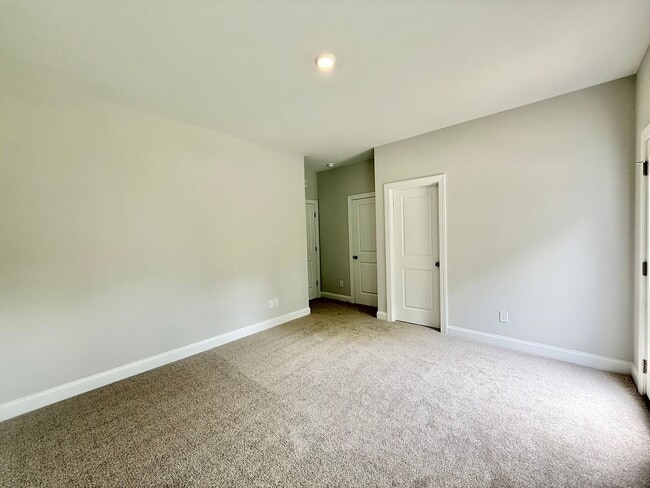 Building Photo - Stunning End Unit New Construction 3BD, 3....