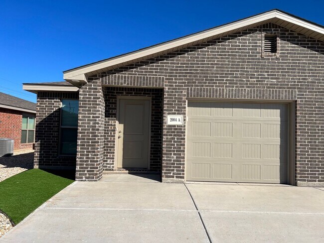 Building Photo - NEW 3 Bedroom In Harvest Development In Wo...
