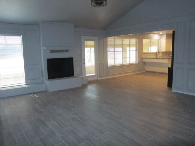 family room with wood burning fireplace - 1330 Maxwell Rd